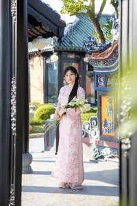 Graceful Asian Lady in Pink Ao Dai with Pristine White Lilies in Traditional Setting-4