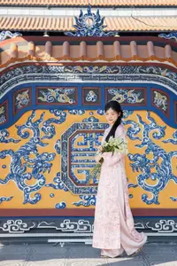 Graceful Asian Lady in Pink Ao Dai with Pristine White Lilies in Traditional Setting-5