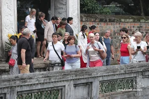 Exploring Hanoi’s Vibrant Lunar New Year Traditions: A Journey Through Spring Festivities, Pagoda Visits, and Cultural Heritage in Vietnam-3