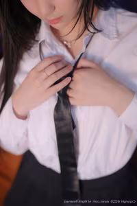 Irresistibly Alluring: Ruan Qing's Chic Uniform Style in XiuRen Photo Series No.10335-4