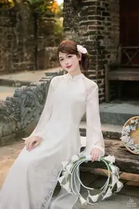 Elegant Asian Beauty: A Gentle Girl Adorned with a Pure White Orchid-12