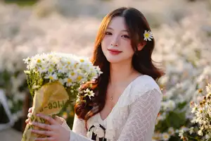 Gentle Muse in White Daisy Field: Youthful Beauty Captivating Hearts Under Golden Hour Sun-17