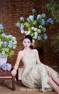 Ethereal Vietnamese Beauty: Graceful Asian Girl in Modern Yếm with Delicate Blooms.-5