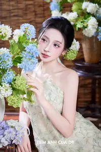 Ethereal Vietnamese Beauty: Graceful Asian Girl in Modern Yếm with Delicate Blooms.-4