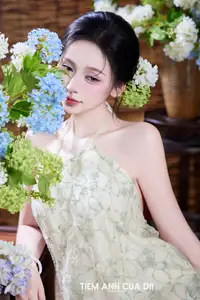 Ethereal Vietnamese Beauty: Graceful Asian Girl in Modern Yếm with Delicate Blooms.-10