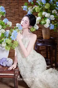 Ethereal Vietnamese Beauty: Graceful Asian Girl in Modern Yếm with Delicate Blooms.-1