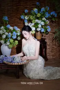Ethereal Vietnamese Beauty: Graceful Asian Girl in Modern Yếm with Delicate Blooms.-11
