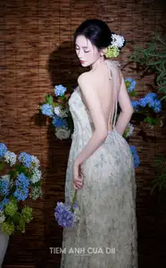 Ethereal Vietnamese Beauty: Graceful Asian Girl in Modern Yếm with Delicate Blooms.-8