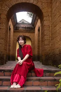 Discover the Timeless Elegance of a Vietnamese Woman in Red Ao Dai at Ancient Architecture.-2