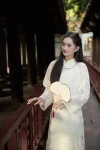 Graceful Vietnamese Woman in Ao Dai Amidst Ancient Architecture-6