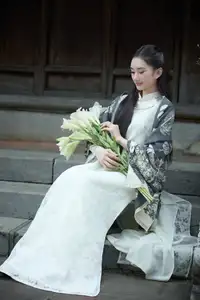Graceful Vietnamese Woman in Ao Dai Amidst Ancient Architecture-5