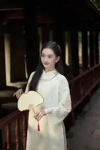 Graceful Vietnamese Woman in Ao Dai Amidst Ancient Architecture-0