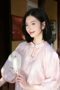 Elegant Vietnamese Girl on Red Lantern Street: Captivating Style & Cultural Charm-0