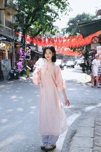 Elegant Vietnamese Girl on Red Lantern Street: Captivating Style & Cultural Charm-6