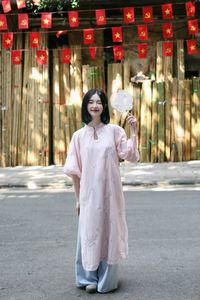 Elegant Vietnamese Girl on Red Lantern Street: Captivating Style & Cultural Charm-11