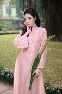 Discover Asian Beauty: Elegant Girl in Dreamy Pink Ao Dai Portrait-11