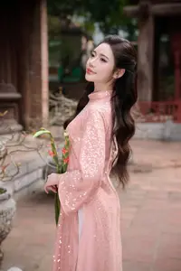 Discover Asian Beauty: Elegant Girl in Dreamy Pink Ao Dai Portrait-4