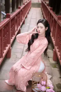 Discover Asian Beauty: Elegant Girl in Dreamy Pink Ao Dai Portrait-16