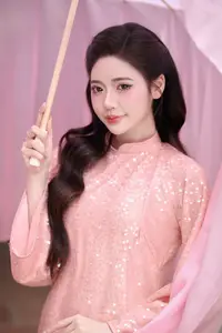 Discover Asian Beauty: Elegant Girl in Dreamy Pink Ao Dai Portrait-6