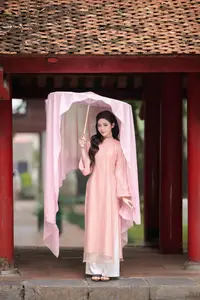 Discover Asian Beauty: Elegant Girl in Dreamy Pink Ao Dai Portrait-13