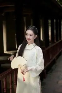 Graceful East Asian Beauty: Woman in Traditional Attire, Elegant with a Paper Fan.-1
