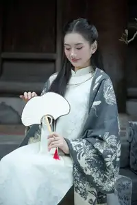 Graceful East Asian Beauty: Woman in Traditional Attire, Elegant with a Paper Fan.-0