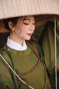 Timeless Vietnamese Charm: Elegant Girl in Traditional Attire and Nón Quai Thao-6