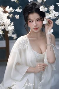 Discover Ethereal Grace: An Asian Beauty in Pure White Amidst Delicate White Blossoms-11