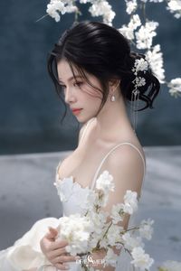 Discover Ethereal Grace: An Asian Beauty in Pure White Amidst Delicate White Blossoms-17