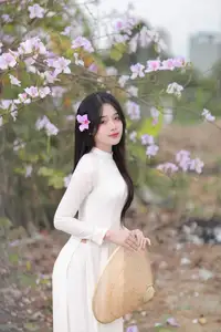Elegant Vietnamese Student in Ao Dai Amidst Bauhinia Flowers-3