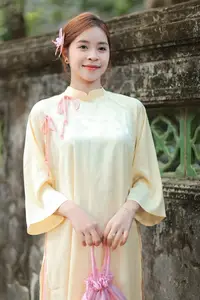 Graceful Vietnamese Girl in Traditional Ao Dai  Discover Timeless Beauty and Elegance-0