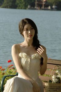 Elegant Beauty of a Girl by the Lake in Serene Natural Scenery-2