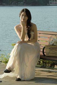 Elegant Beauty of a Girl by the Lake in Serene Natural Scenery-7