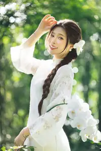 Charming Young Woman in White Lace & Orchids: Radiant Natural Beauty Amidst Greenery 1000026906-1