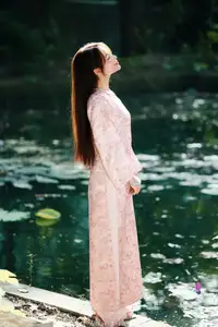 Vietnamese Charm: Elegant Beauty in Pink Traditional Attire-14