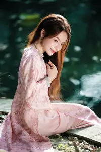 Vietnamese Charm: Elegant Beauty in Pink Traditional Attire-6