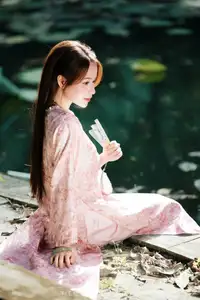 Vietnamese Charm: Elegant Beauty in Pink Traditional Attire-13