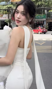 VGU No.8: Young Woman in White Dress with Pristine White Rose Bouquet and Charming Smile.-0