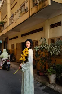Stunning Transformation: Vietnamese Karate Champion Trang Cẩm Lành Embraces Elegance in Traditional Áo Dài Fashion-1