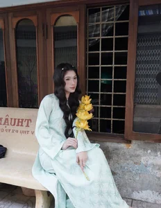 Stunning Transformation: Vietnamese Karate Champion Trang Cẩm Lành Embraces Elegance in Traditional Áo Dài Fashion-2