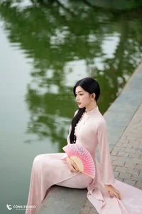 Graceful Muse in Traditional Pink Ao Dai-6
