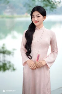 Graceful Muse in Traditional Pink Ao Dai-4