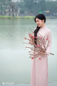 Graceful Muse in Traditional Pink Ao Dai-5
